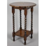 An Edwardian Circular Topped Two Tier Occasional Table with Barley Twist Supports, 48cm Diameter