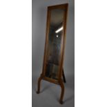 An Edwardian Oak Easel Back Cheval Mirror on Cabriole Supports and Gadrooned Border, 136cm high