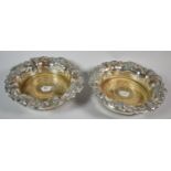 A Pair of Sheffield Plate Bottle Coasters with Moulded and Pierced Vine Decoration, 19cm Diameter