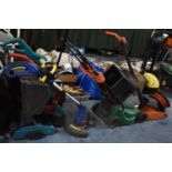 A Collection of Various Electrical Garden Tools, Strimmers, Mowers, Edgers, Lawn Rake, All Untested