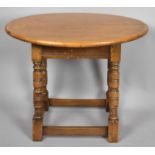 A Mid/Late 20th Century Oval Top Oak Occasional Table on Four Turned Supports, 60cm Wide