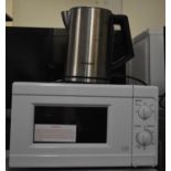 A Bosch Stainless Steel Kettle and a Microwave Oven