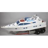 A Large Radio Controlled Model of a Power Boat Yacht on Trailer, 135cm Long, No Controllers and in