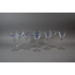 A Set of Eight Manage to Win Cocktail Glasses, 19cm high