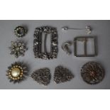 A Collection of White Metal Belt Buckles and Four Jewelled Brooches