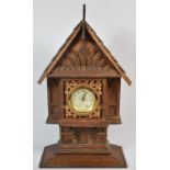 A Carved Wooden Gingerbread Clock of Architectural Form, 34cm High