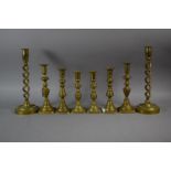 Four Pairs of Brass Candlesticks, Tallest 29cm high