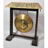 A Mid 20th Century Oriental Table Gong on Laquered Architectural Stand, 35cm Wide