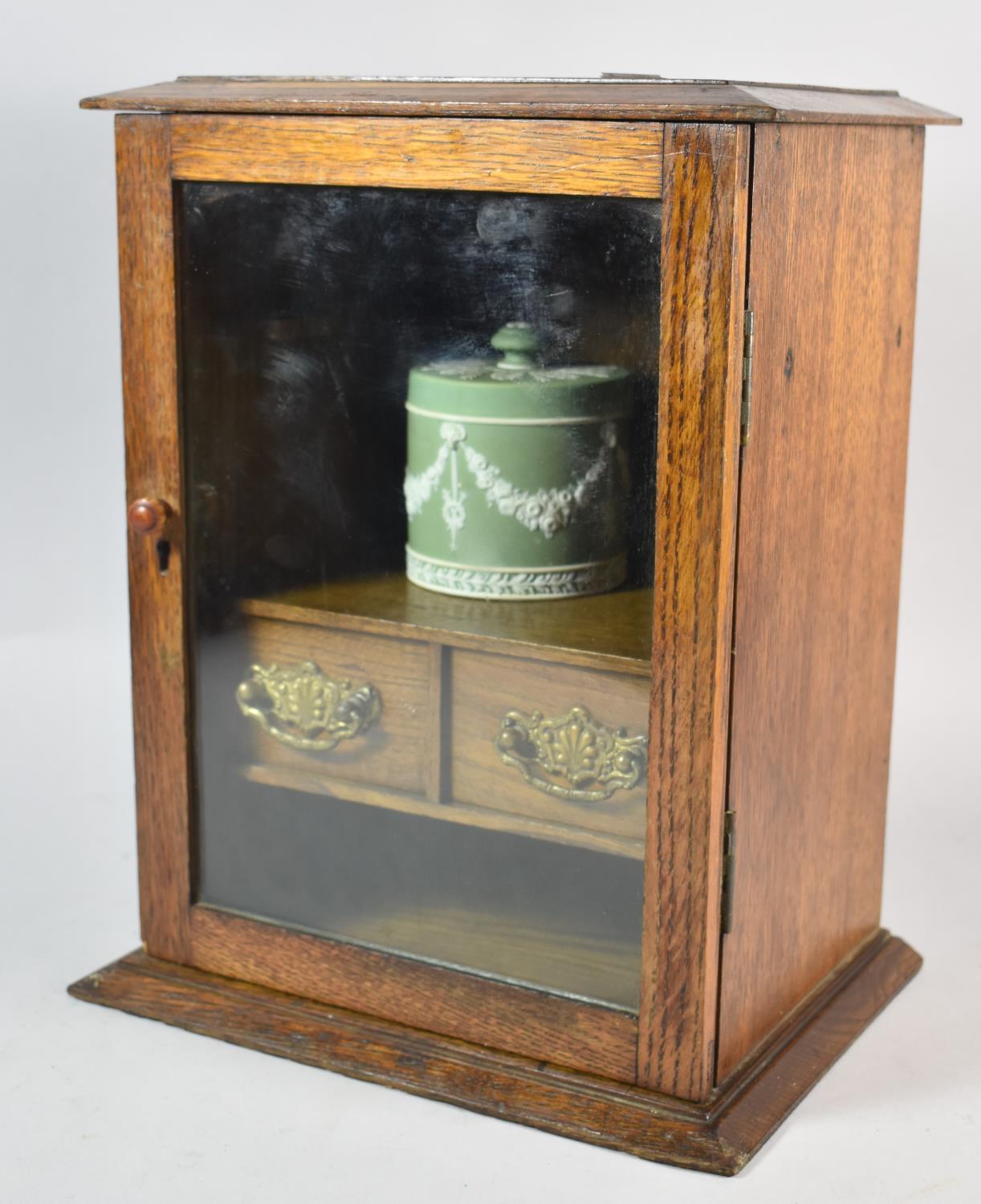 An Edwardian Oak Smokers Cabinet with Fitted Interior and Two Inner Drawers, Wedgwood Green