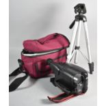 A Modern Camera Tripod, Camcorder and Bag
