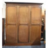 An Edwardian Mahogany Triple Wardrobe on Plinth Base, 185cm wide