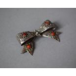 A Pretty Silver Brooch in the Form of Bow with Coral Mounts, German 800 Silver