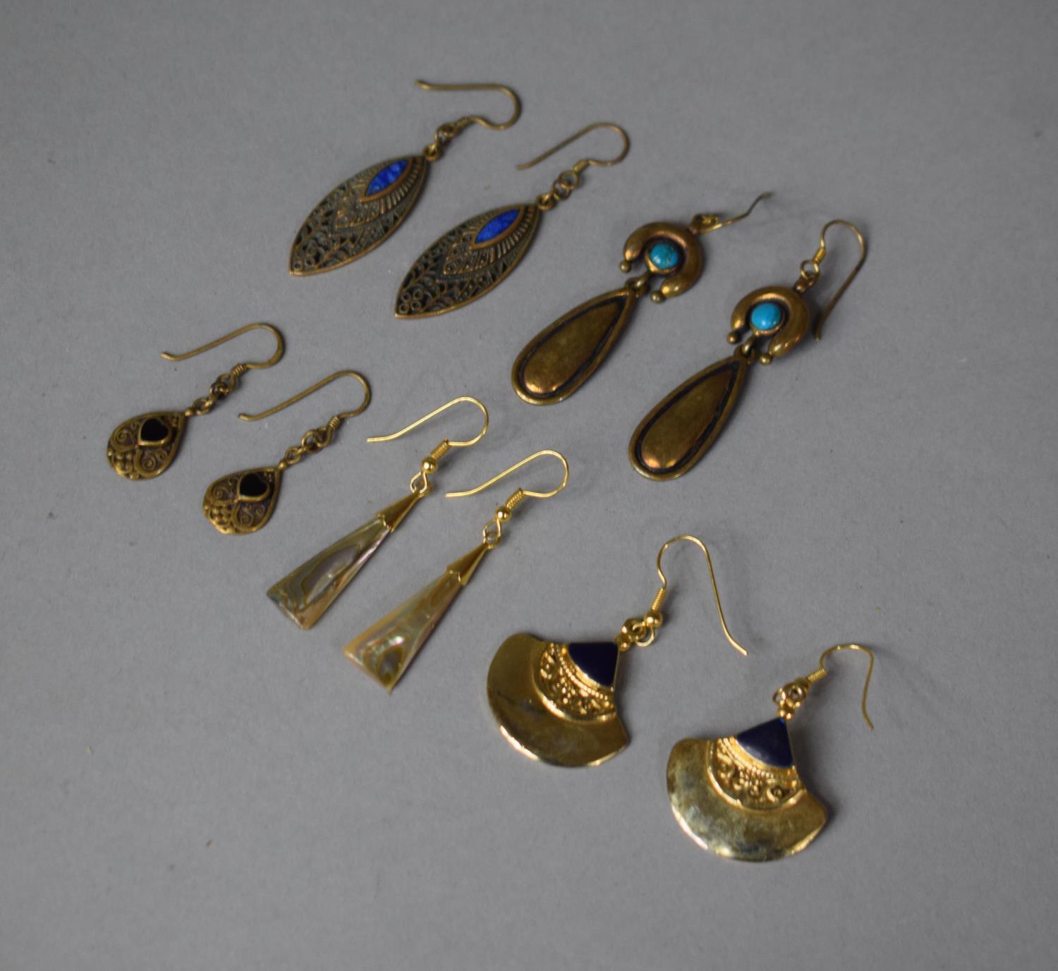 A Collection of Various Egyptian Revival Style Earrings, Some with Stone Mounts