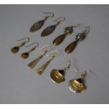 A Collection of Various Egyptian Revival Style Earrings, Some with Stone Mounts