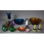 A Collection of Coloured Glassware to Include Penguin Paperweight, Green Jugs, Carnival Glass, Amber