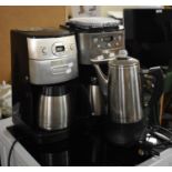 Two Coffee Making Machines and a Coffee Percolator