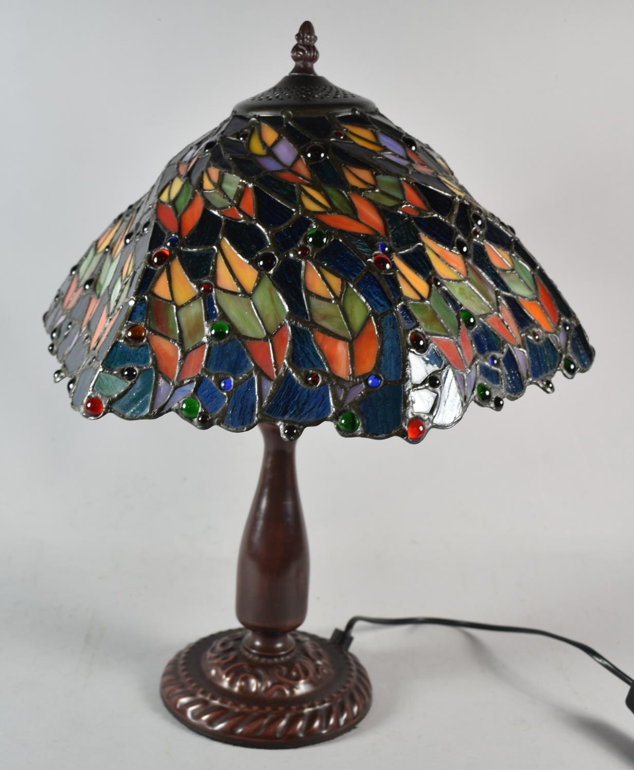 A Reproduction Bronze Effect Table Lamp with Tiffany Style Shade, 45cm high