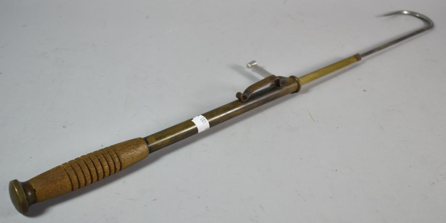A Late 19th/Early 20th Century Wooden Handled Brass and Steel Retractable Fishing Gaff