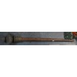 A Part Wooden Curtain Pole with Brass Finial and Rings