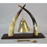 An Early 20th Century Novelty Dinner Gong Formed from Horns with Far Eastern Bell and Clapper,