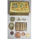 A Vintage Tin Containing Various Curios to Include Coin Case, Military Badges, Coronation and