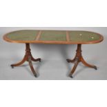 A Modern Oval Twin Pedestal Coffee Table with Three Tooled Leather Panels to Top, 121cm wide