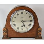 An Art Deco Oak Westminster Chime Mantle Clock, the Silvered Dial Inscribed Butt & Co. Chester, 28cm