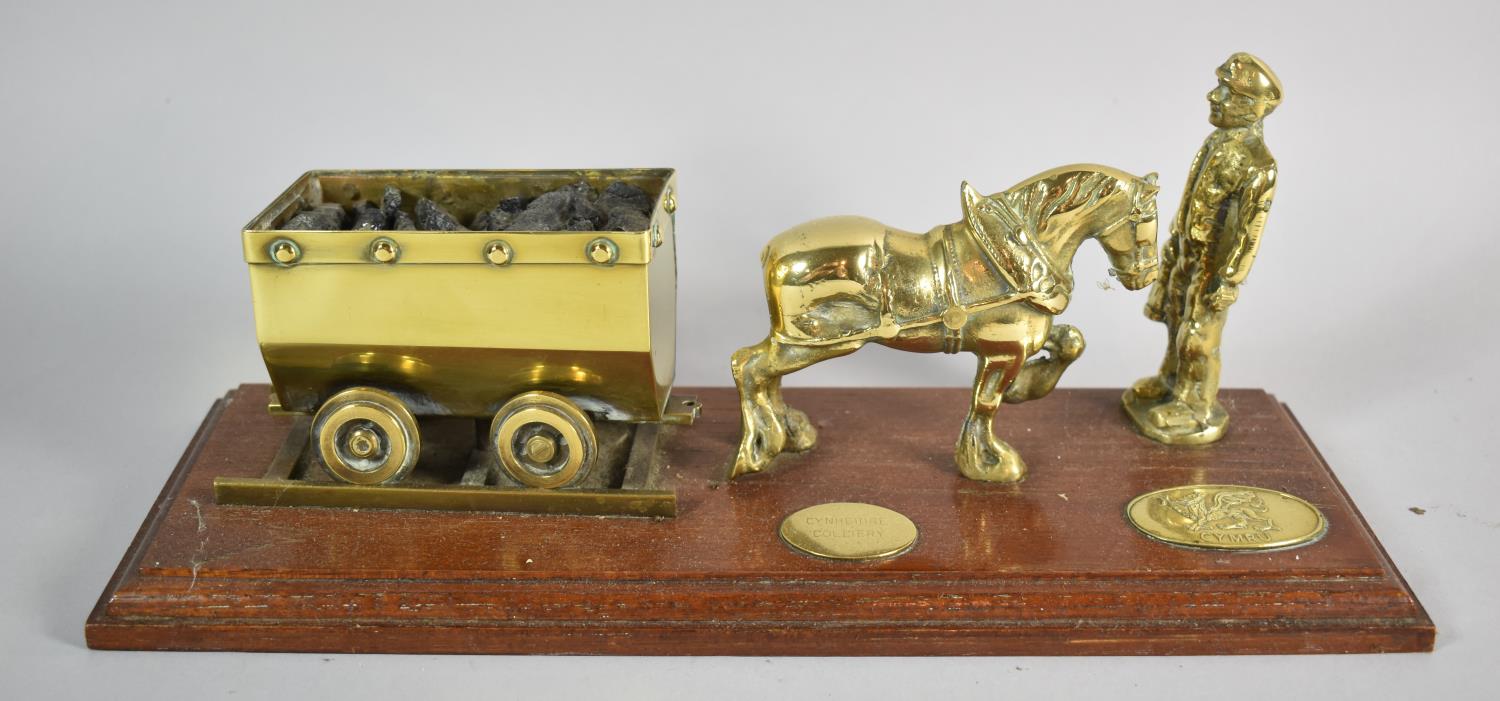 A Welsh Brass Study of Minor, Pit Pony and Coal Truck with Disk Inscribed Cynheidre Colliery, Oak