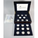 A Mahogany Cased Set of 17 Royal Mint Silver Proof Coins, HM Queen Elizabeth II 80th Birthday 2006