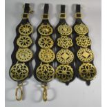 Two Pairs of Polished Leather Harness Straps each with Four Victorian Pierced Brasses