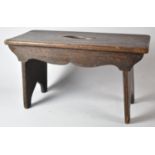 A Small Stained Oak Rectangular Topped Stool, 35cm Long