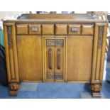 An Art Deco Galleried Oak Sideboard with Two Top Drawers Over Cupboard Base, 121cm wide