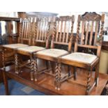 A Set of Four Edwardian Barley Twist Oak Framed Tapestry Pad Seated Dining Chairs