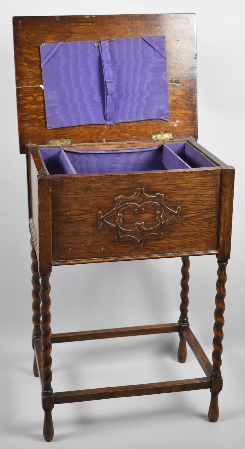 A Mid 20th Century Oak Lift Top Sewing Box on Barley Twist Supports, 62cm high - Image 2 of 2