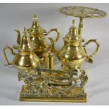 A Collection of Brassware to Include Three Coffee Pots, Circular Pierced Trivet, Bed Chamber Stick