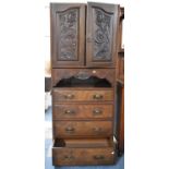 A Centre Section From a Late 19th Century Mahogany and Walnut Triple Wardrobe Having Four