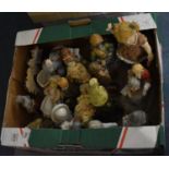 A Box Containing Various Continental Bisque Figural Ornaments