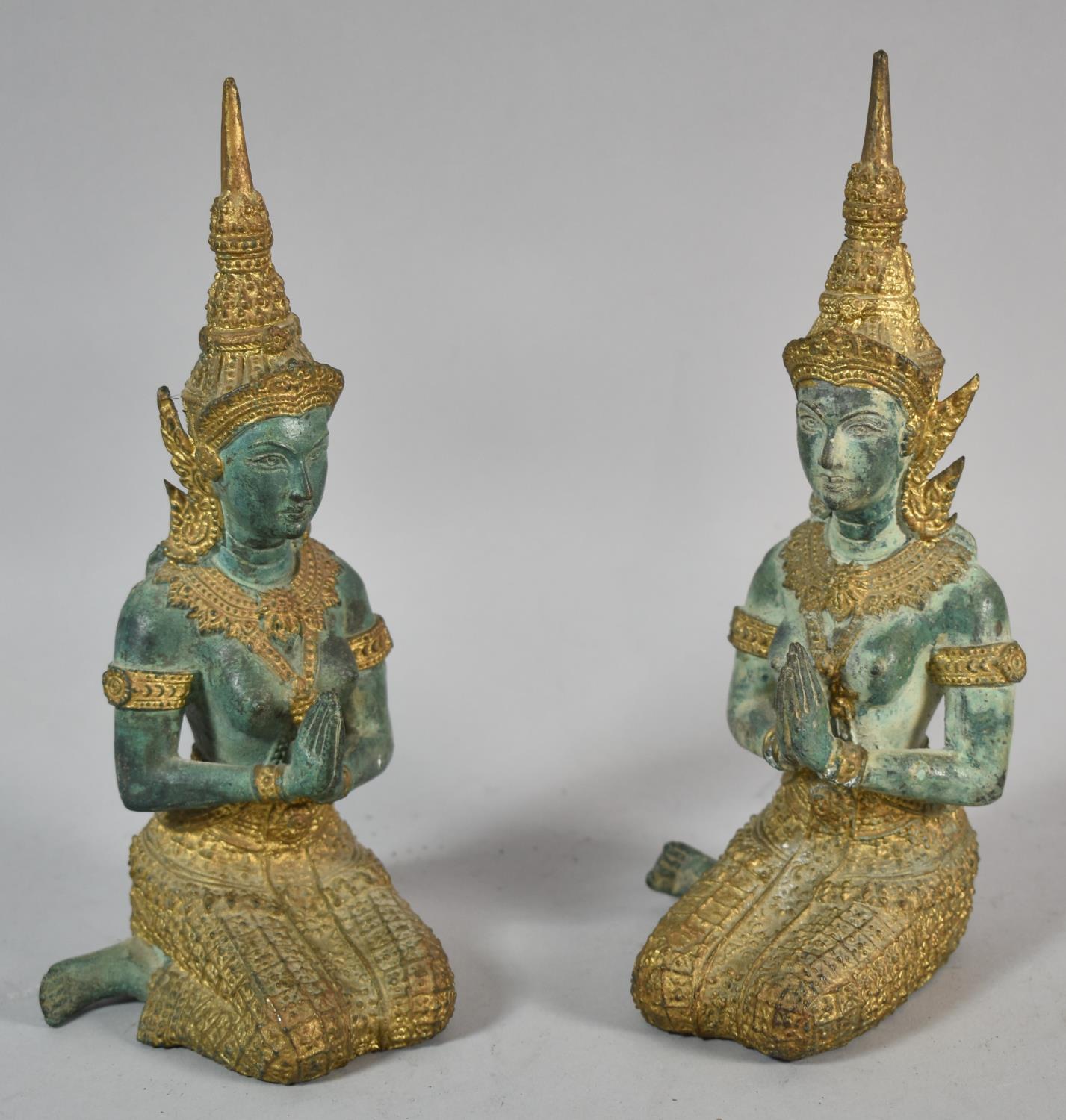 A Pair of Thai Bronze Figures of Kneeling Maidens, 22cm high