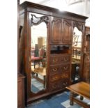 A Late Victorian/Edwardian Mahogany Wardrobe with Centre Section Having Four Blind Carved Drawers,