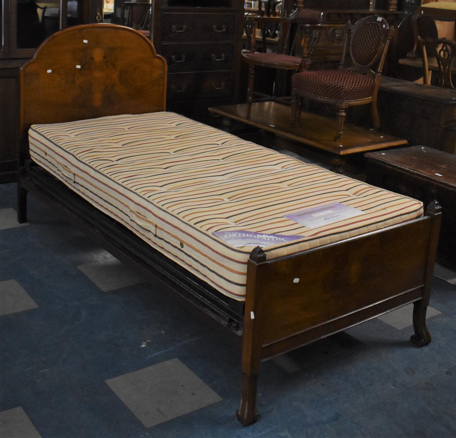 An Edwardian Walnut Single Bed with Mattress