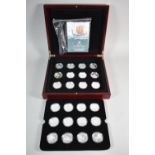 A Mahogany Cased Royal Mint Set of 24 Silver Proof Coins, "Legendary Fighting Ships" Complete with