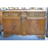 An Art Deco Oak Galleried Sideboard with Three Top Drawers Over Cupboard Base, 133cm wide