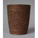 A Bronze Far Eastern Intricately Etched Beaker, Decorated in Relief with Flowers, 9.5cm High