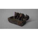 A Small Bronze Study of Piglets Feeding at Trough, 5cm