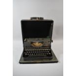 A Vintage Olympia Simplex Manual Portable Typewriter in Case
