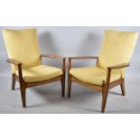 A Pair of 1970's Parker Knoll Teak Framed Arm Chairs