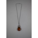 A Silver and Amber Pendant by GM, on Silver Chain Stamped 925