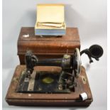 A Vintage Oak Cased American Sewing Machine