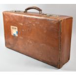 A Vintage Leather Suitcase Monogrammed EBM, 66cm wide