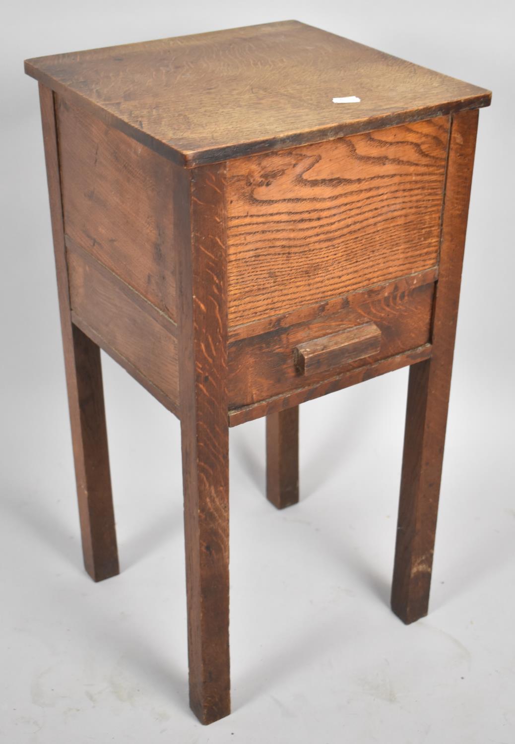 An Edwardian Oak Lift Top Sewing Box on Stand, 33cm wide